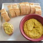 sliced baguette with roasted pepper dip recipe from cleveland cooking