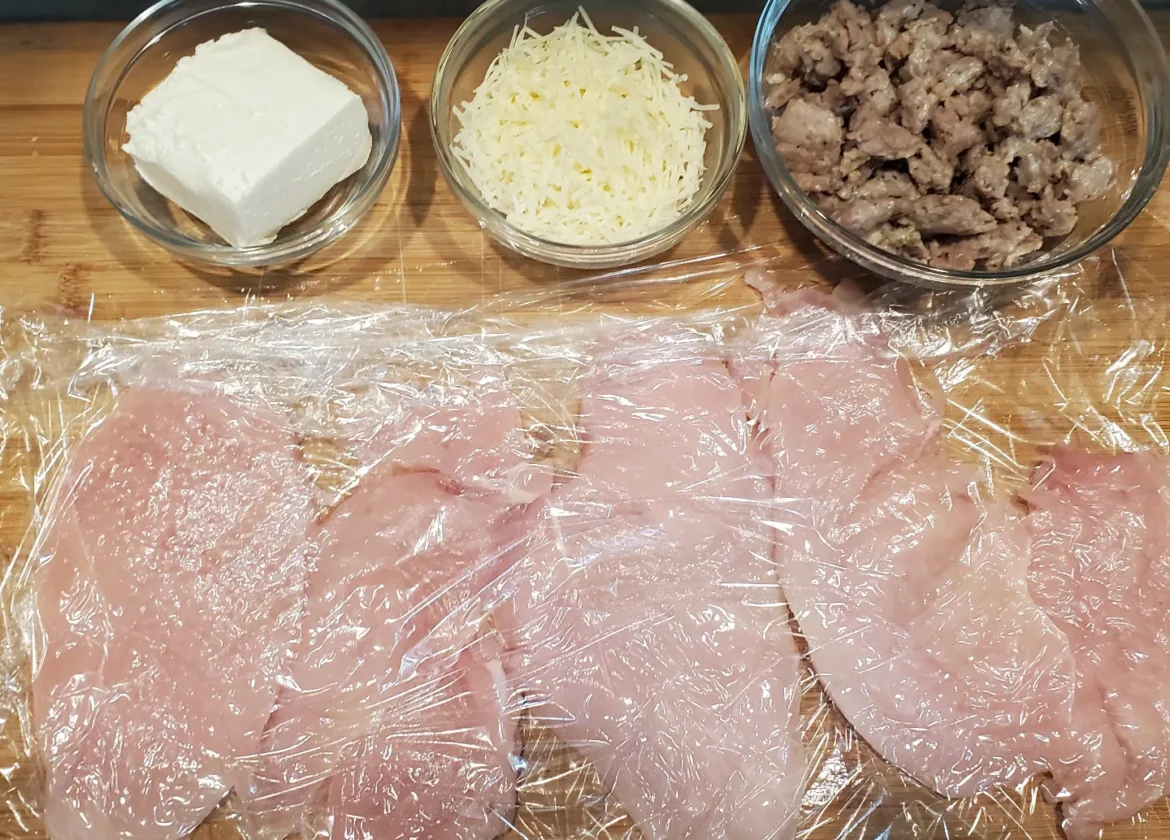 All ingredients in italian stuffed chicken breasts recipefrom cleveland cooking. Chicken breasts, chream cheese, asiago cheese, and italian sausage