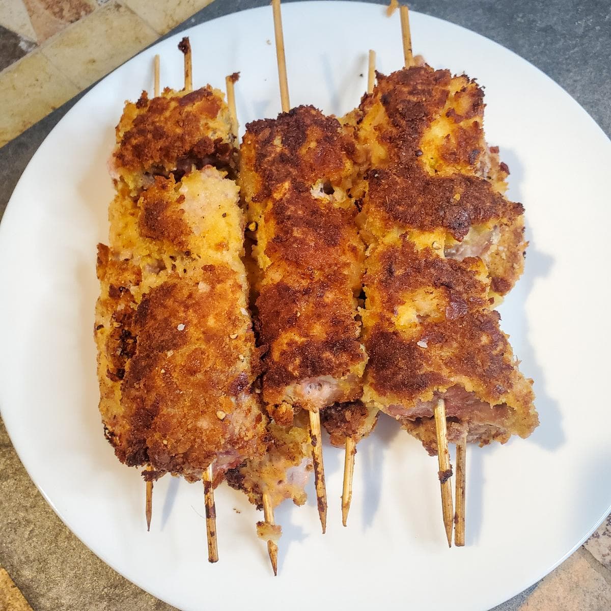 City Chicken recipe from cleveland cooking. Breaded pork cooked on skewers