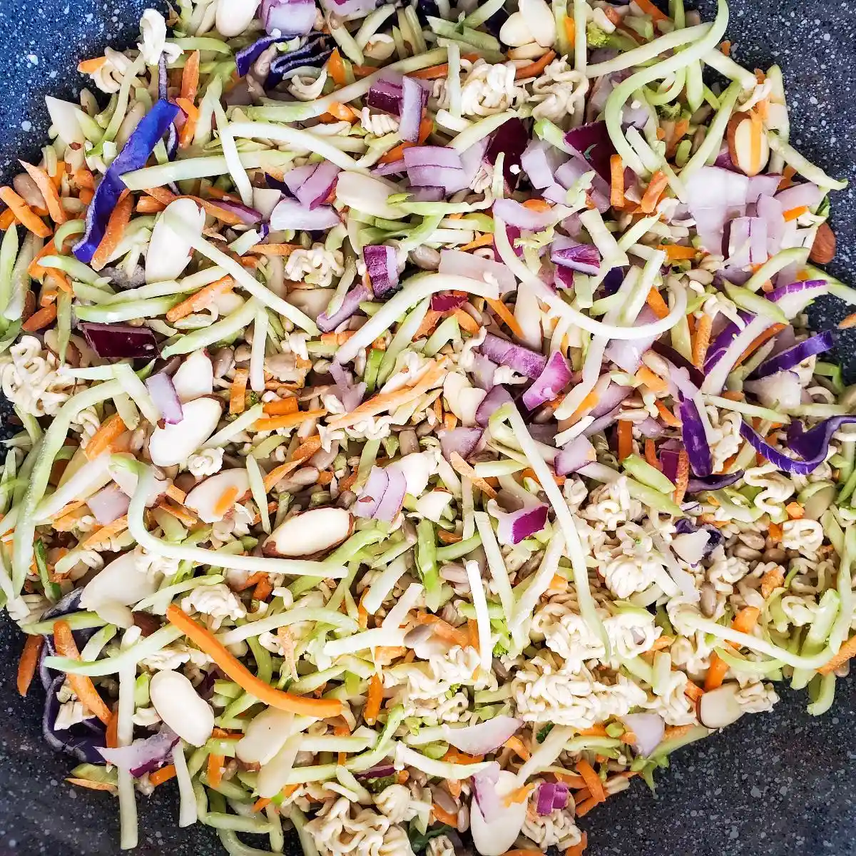 broccoli ramen slaw recipe from cleveland cooking. veggies, ramen noodles, and an incredible vinaigrette!