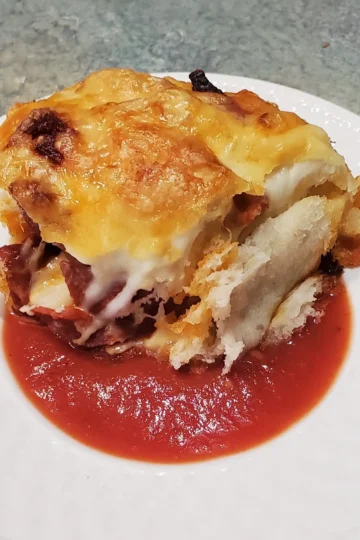 pizza roll from cleveland cooking in pizza sauce