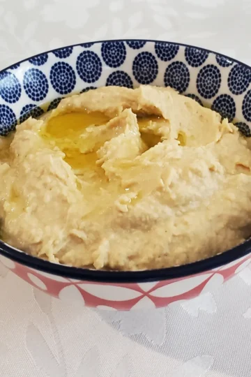 roasted garlic hummus with a bit of olive oil drizzled on top from cleveland cooking