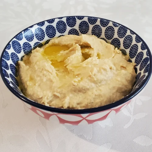 roasted garlic hummus with a bit of olive oil drizzled on top from cleveland cooking