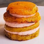 Roasted yellow beets layered with red plum goat cheese sauce