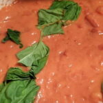 Spicy blush sauce with basil leaves from cleveland cooking