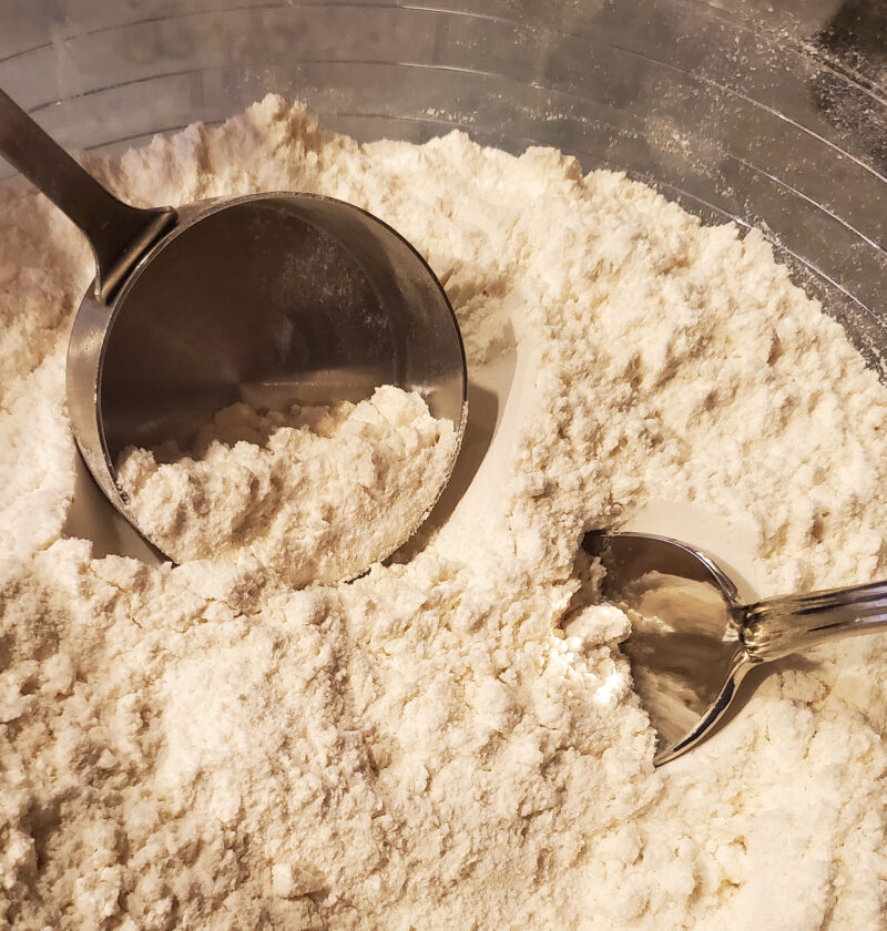 flour with measuring scoop cleveland cooking