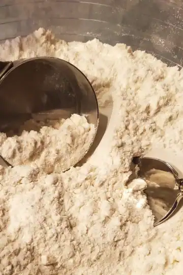 flour with measuring scoop cleveland cooking
