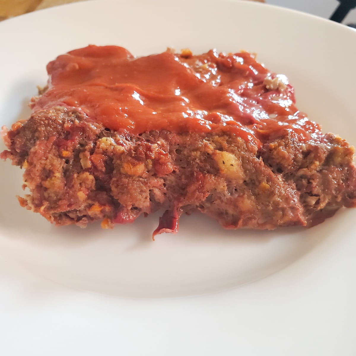 Our Favorite Meatloaf Recipe from Cleveland Cooking. Meatloaf with a sweet tomato sauce baked on top.