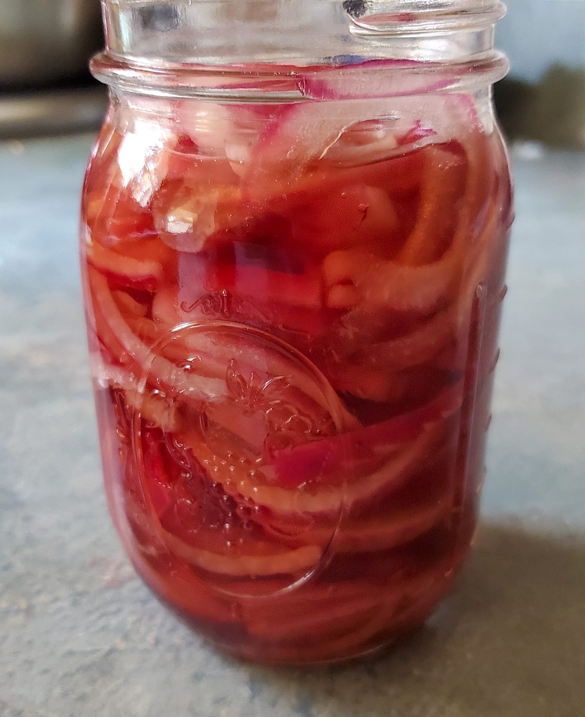 pickled red onions in a mason jar from cleveland cooking