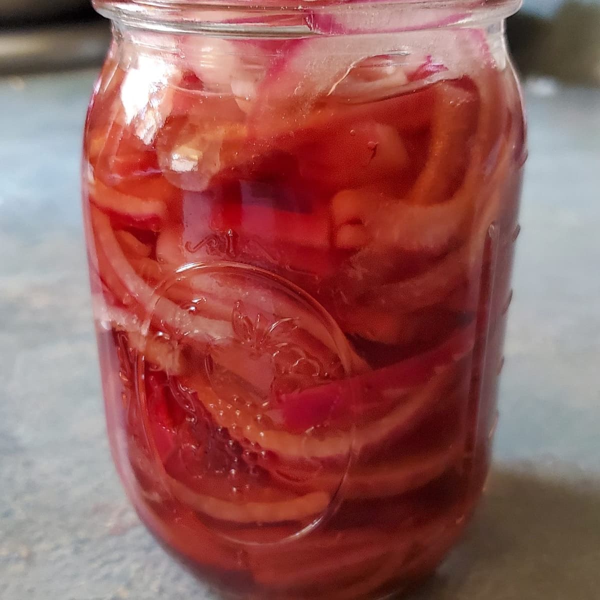 pickled red onions in a mason jar from cleveland cooking