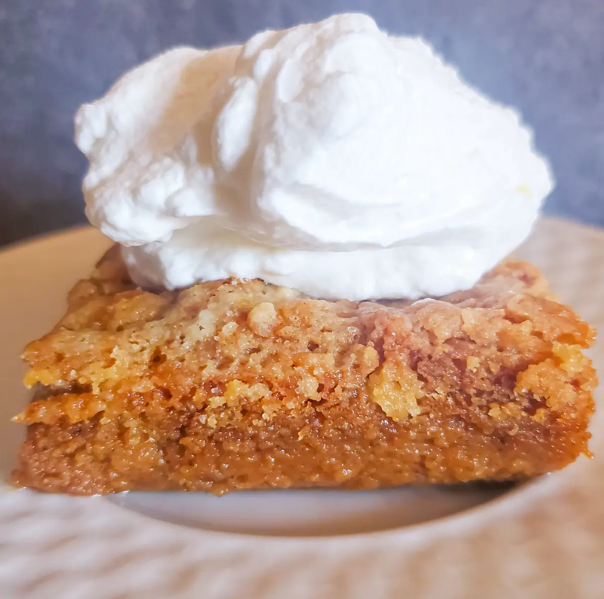 pumpkin cake dessert with whipped cream topping from cleveland cooking Bring fall to your dinner table with my Pumpkin Cake Dessert, Apple Swiss Salad or my other family favorite recipes! I have quick and easy recipes!