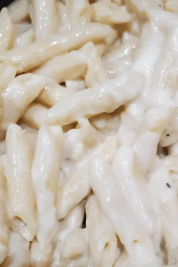 easy creamy mac and cheese recipe from cleveland cooking. pasta covered in a creamy cheese sauce.