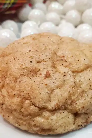 eggnog snickerdoodle cookies from cleveland cooking. Christmas decorations in the background.