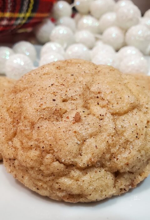 eggnog snickerdoodle cookies from cleveland cooking. Christmas decorations in the background.