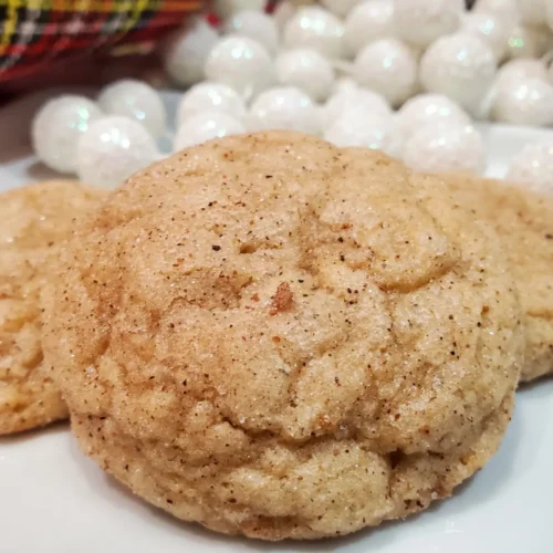 eggnog snickerdoodle cookies from cleveland cooking. Christmas decorations in the background.