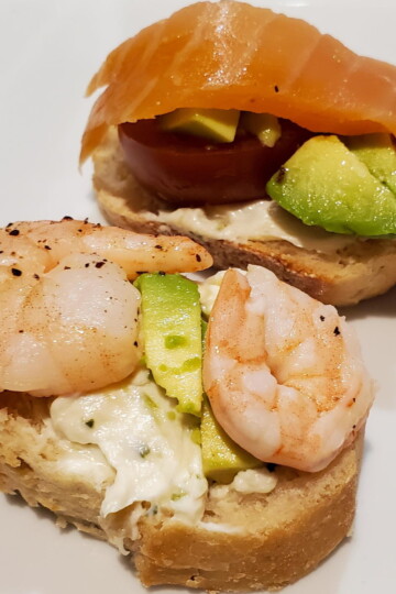 Shrimp and smoked salmon baguettes with avocado and tomato. And a roasted garlic spread from Cleveland cooking