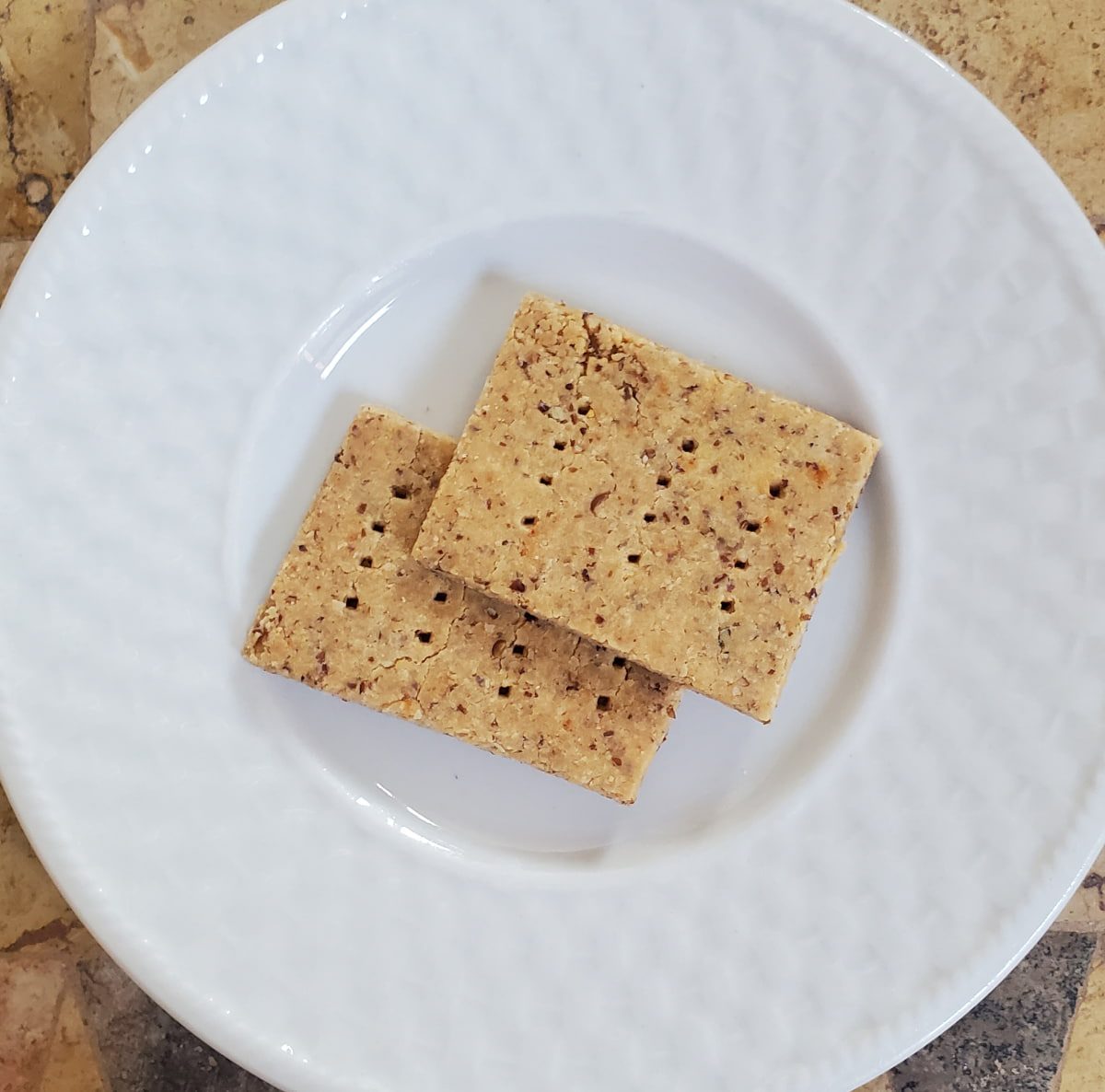 gluten free crackers on a plate. Simple Gluten Free Cracker Recipe from cleveland cooking