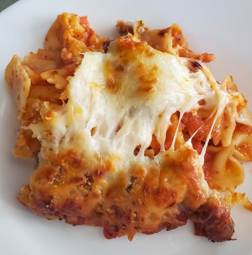 italian pasta bake from cleveland cooking. Melted cheese over pasta, sauce, and sausage.