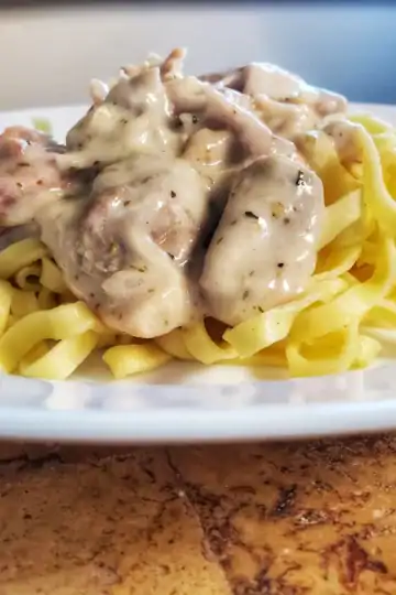 Cottage cheese Alfredo sauce mixed with sausage and chicken over pasta Cleveland cooking