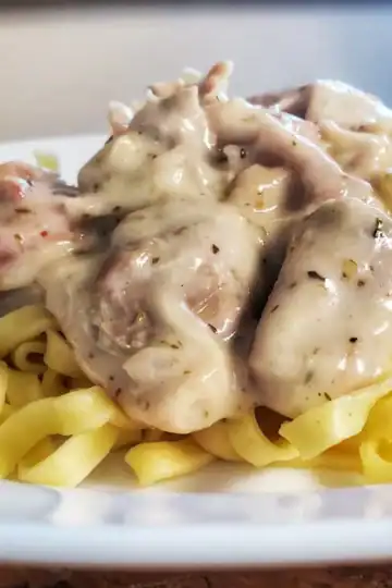 Cottage cheese Alfredo sauce mixed with sausage and chicken over pasta Cleveland cooking