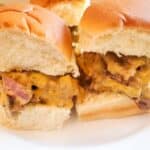 steak with queso on a sweet bread bun. Queso steak sliders recipe by cleveland cooking