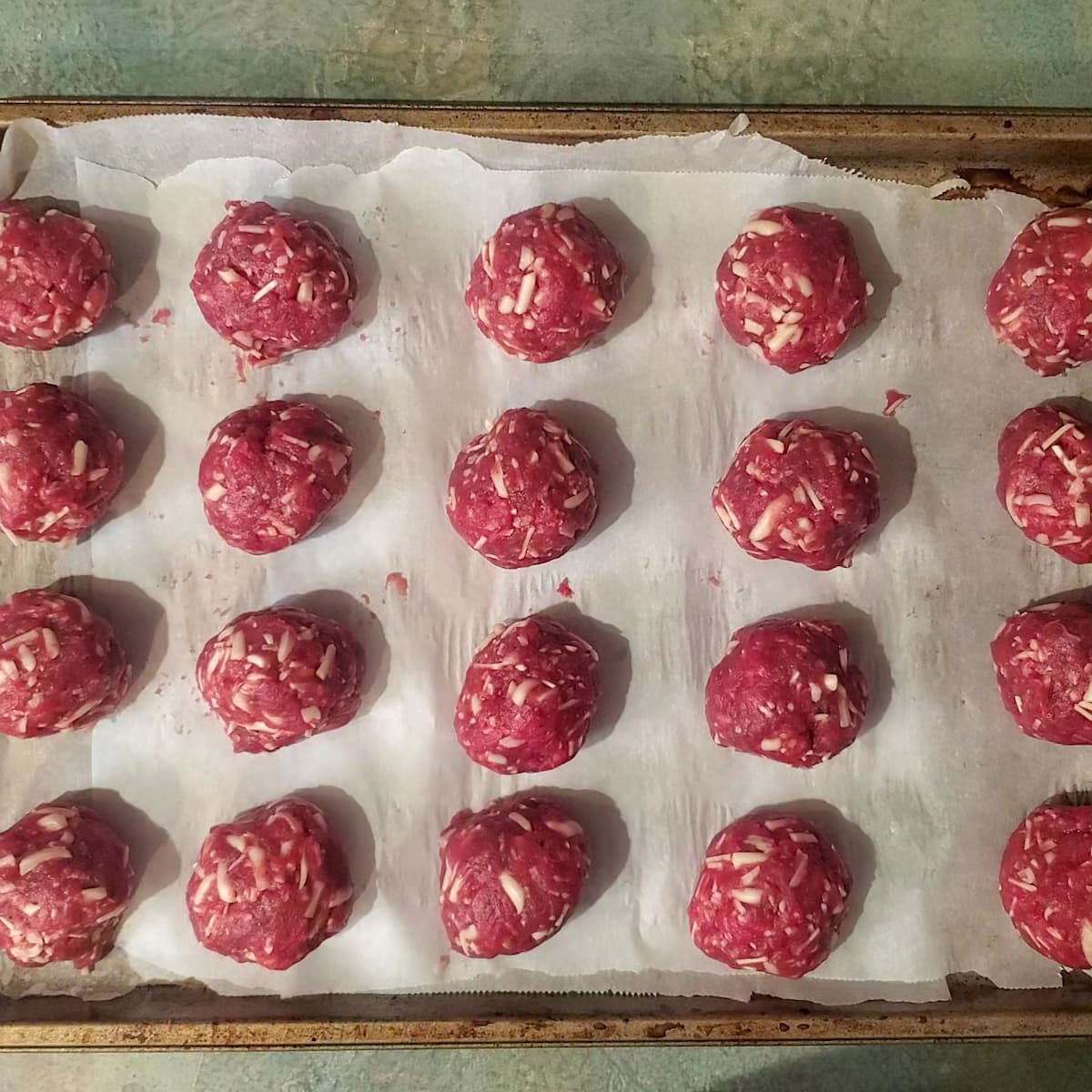 cheesy meatballs ready to go in the oven from cleveland cooking