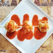 buffalo chicken meatballs Cleveland cooking. cheesy meatballs with buffalo wing sauce.