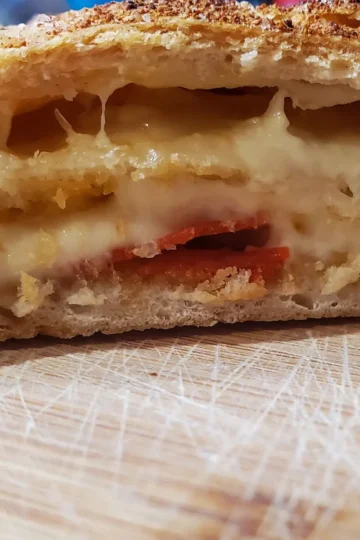 pepperoni bread from Cleveland cooking. pepperoni and mozzarella cheese rolled in a pizza dough crust.