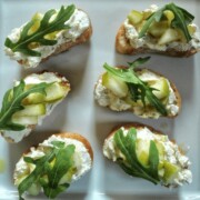 pear and arugula crostini from Cleveland cooking. pear with a vinaigrette on top of a whipped feta cheese spread.