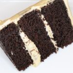 Three layer chocolate cake with whipped peanut butter frosting. Recipe for the frosting is from cleveland cooking.