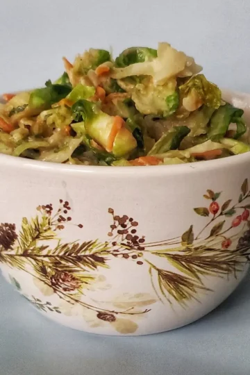 tahini Miso slaw dressing from Cleveland cooking. A mixture of tahini Miso and bagged slaw. A very easy recipe.