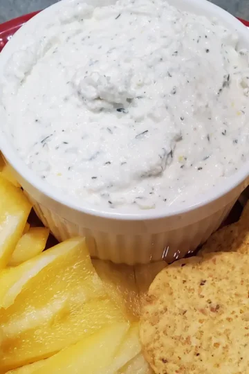 feta dip with lemon and thyme by Cleveland cooking. dip is served with peppers and chips