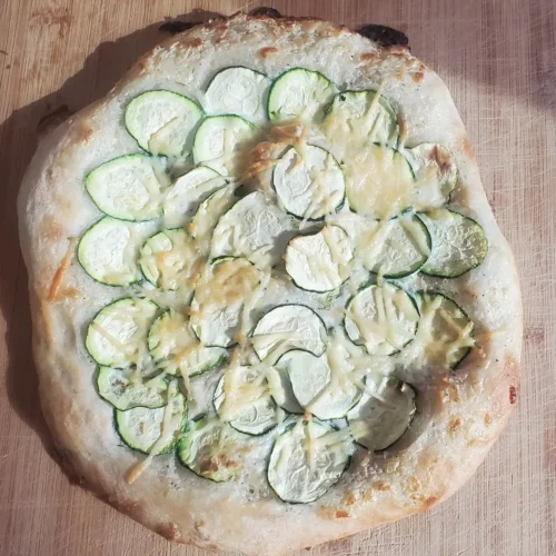 zucchini pizza from cleveland cooking. zucchini with a garlic cream sauce topped with parmesan cheese