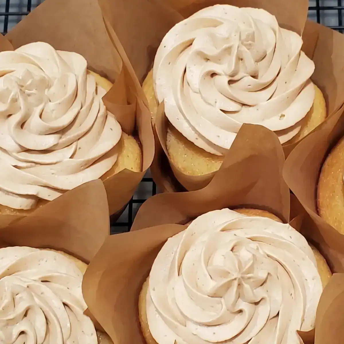 whipped peanut butter frosting from Cleveland cooking. a three tiered chocolate cake with whipped peanut butter frosting.