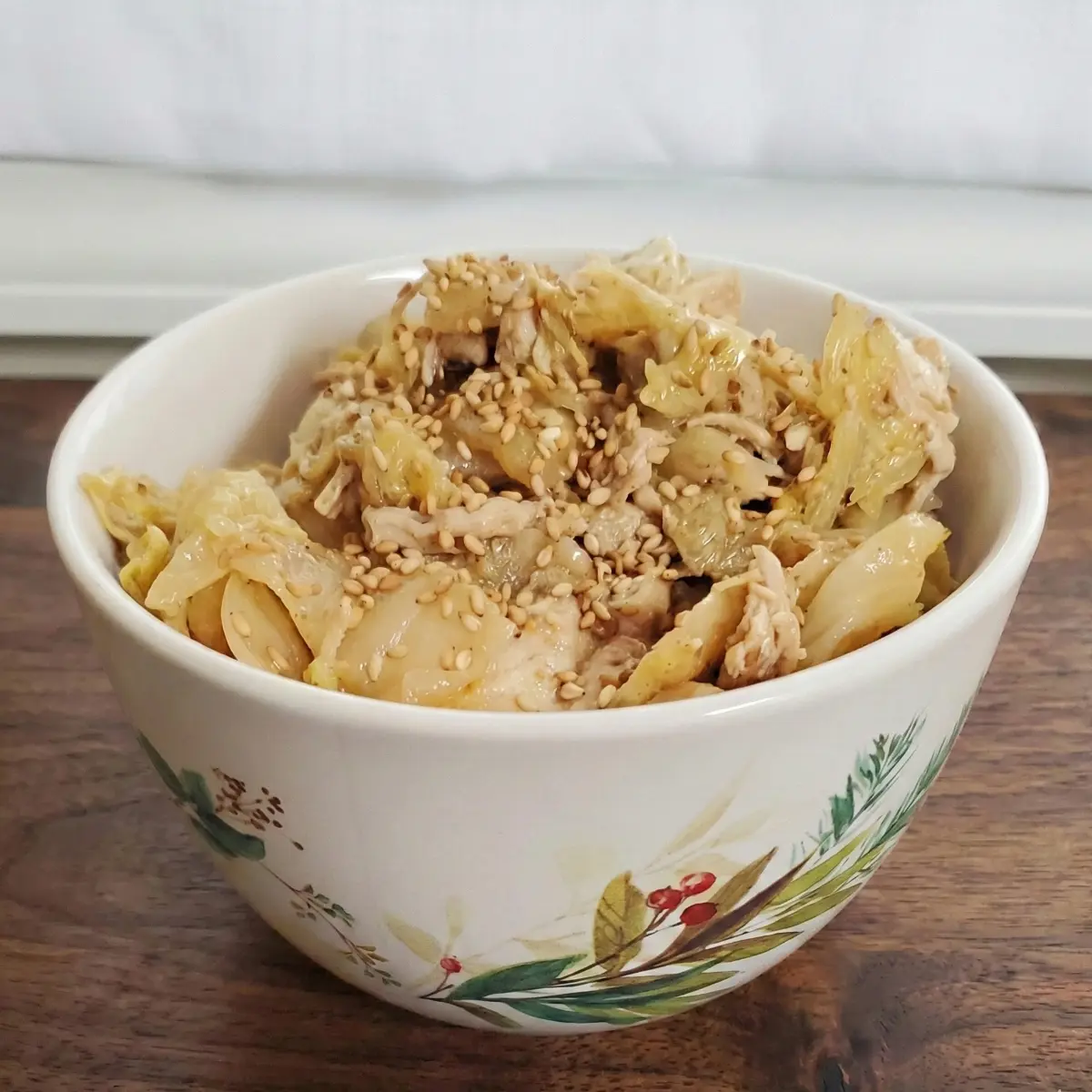 sesame ginger chicken served in a bowl with sesame seeds on top. Cleveland cooking