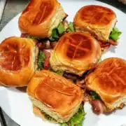 smoked salmon BLT sliders. 6 sliders with smoked salmon, bacon, lettuce, tomato, and mayonnaise. Cleveland cooking