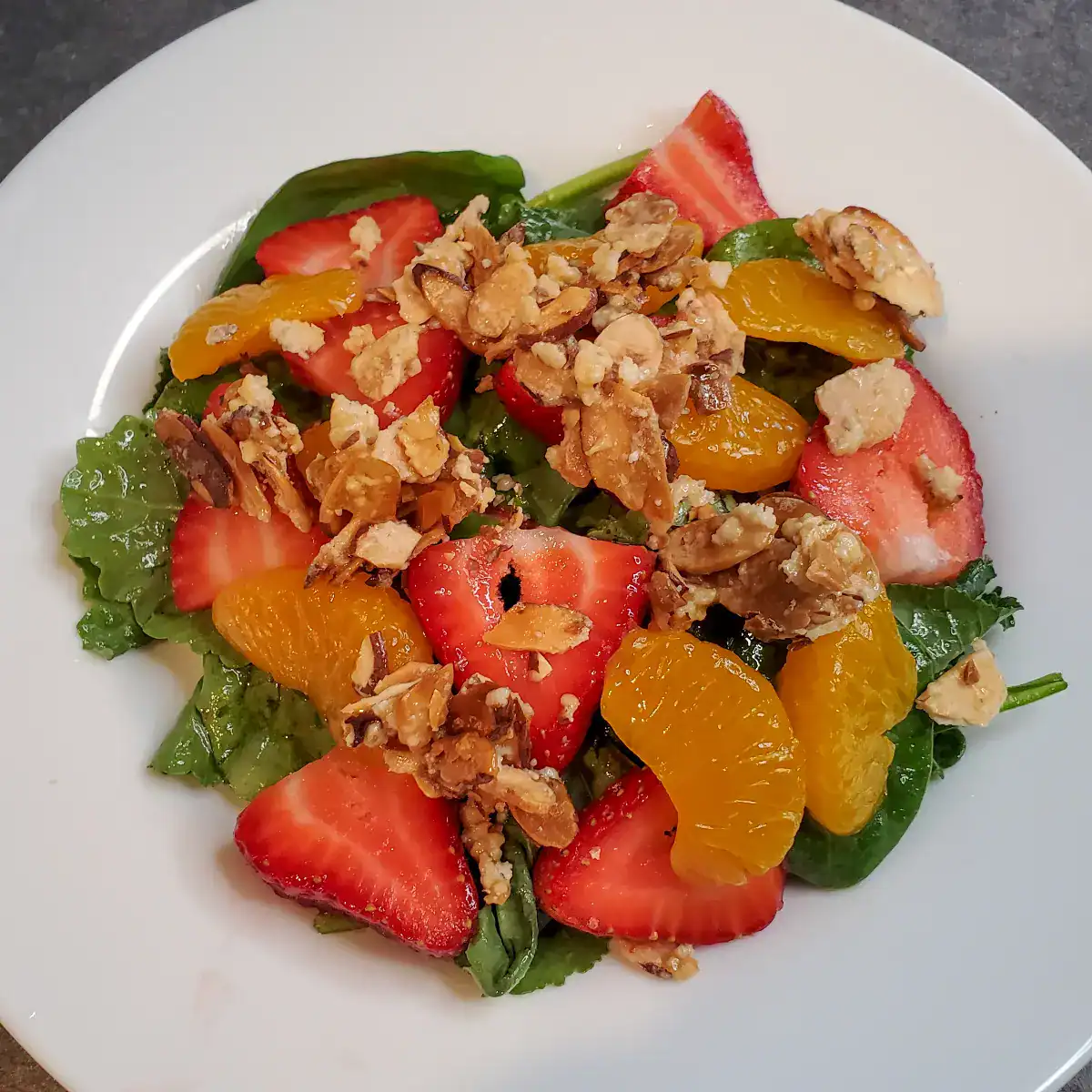 strawberry almond salad with mandarin oranges and almond croutons